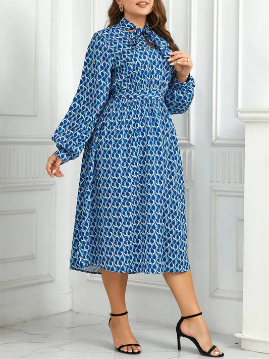 Anneliese | Elegant midikjole med moderne print